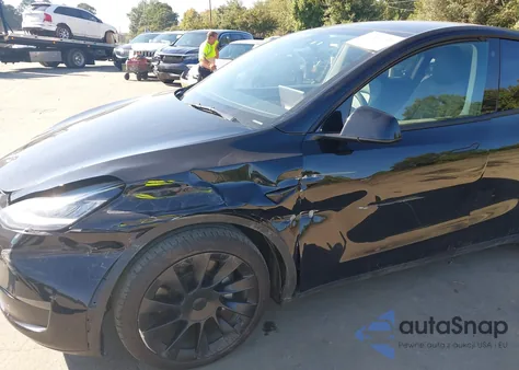 2022 Tesla Model Y Long Range Dual Motor All-Wheel Drive z USA, uszkodzony, nr VIN 7SAYGAEE8NF574463